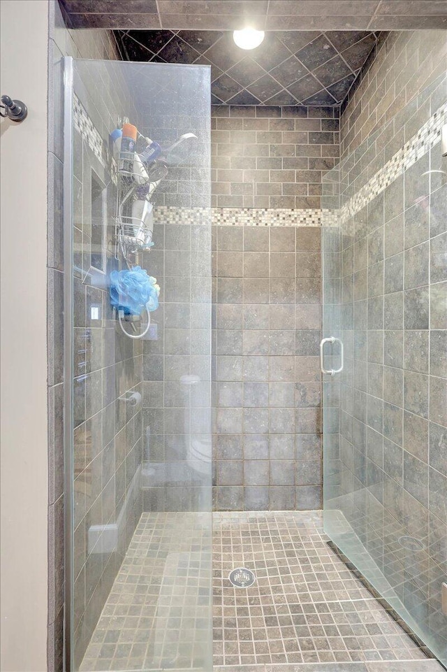 full bathroom with a stall shower