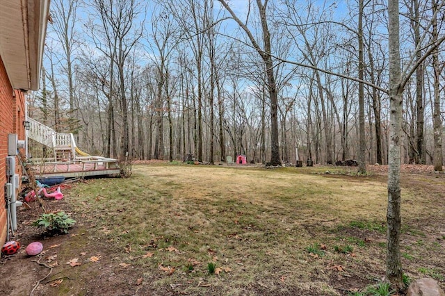 view of yard featuring a view of trees