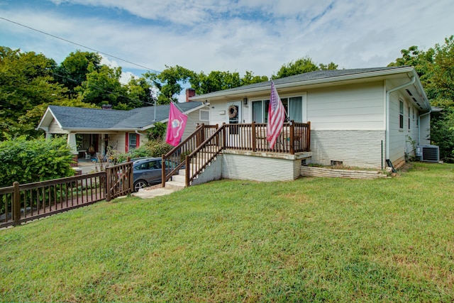 ranch-style house with brick siding, crawl space, a front yard, and central air condition unit