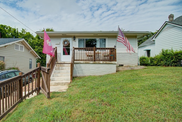 view of front of home with a front lawn