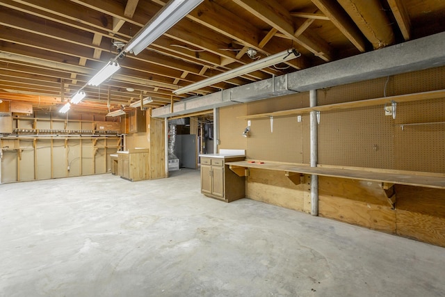 basement with a workshop area