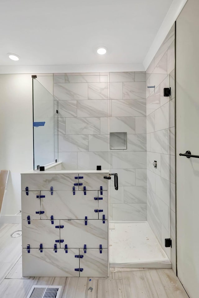 bathroom with a stall shower