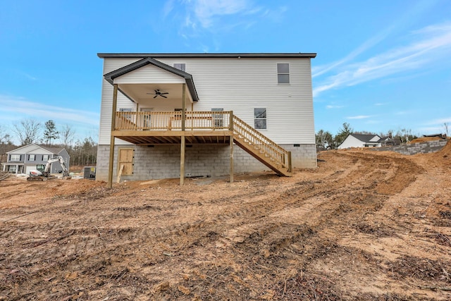 back of house with ceiling fan, crawl space, stairs, cooling unit, and a wooden deck