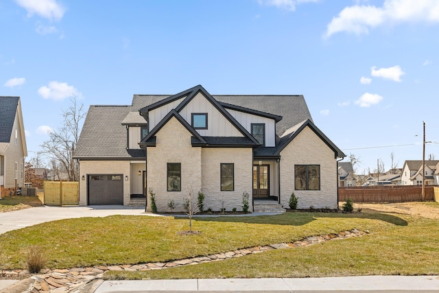 modern farmhouse style home with driveway, fence, central air condition unit, a front lawn, and board and batten siding