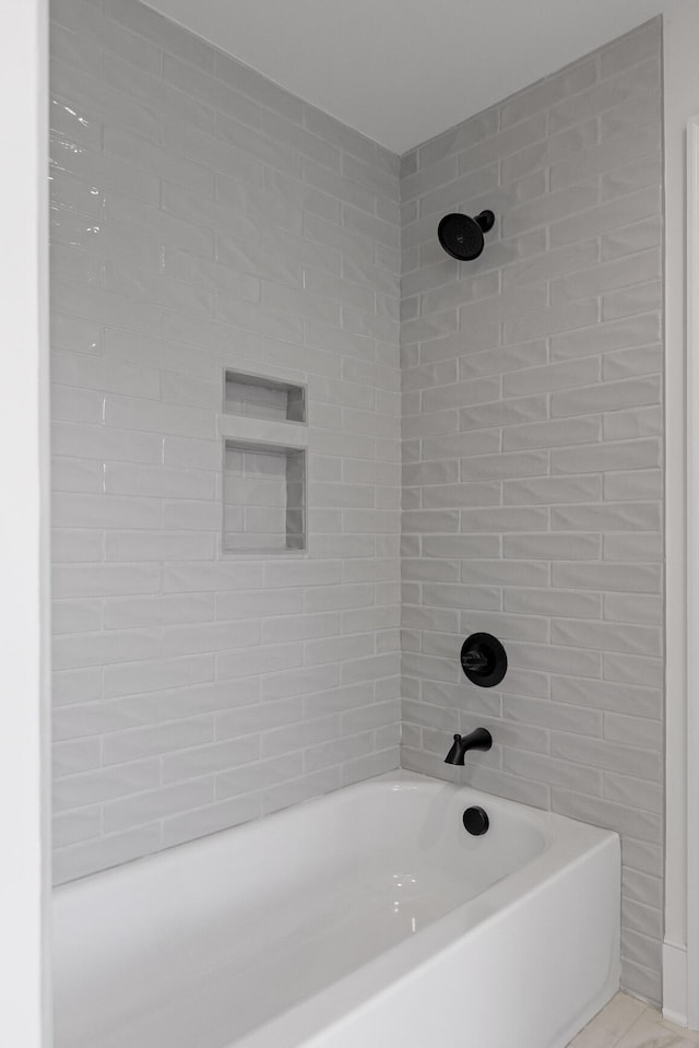 bathroom featuring tub / shower combination