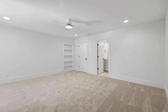 unfurnished bedroom with baseboards, connected bathroom, ceiling fan, carpet floors, and recessed lighting