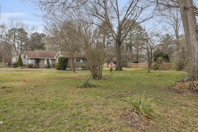 view of yard with fence