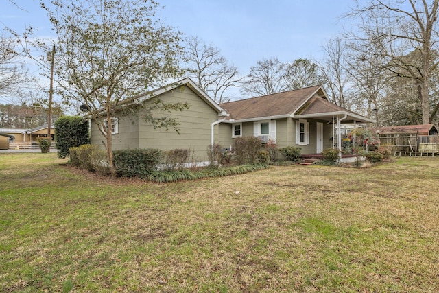 view of front facade with a porch and a front lawn