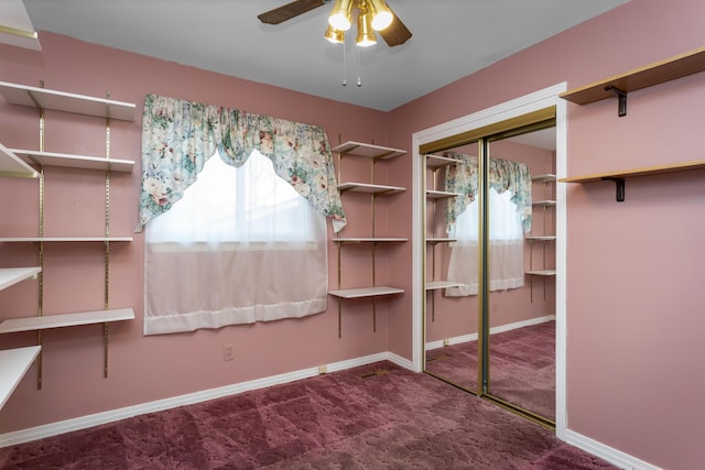 unfurnished bedroom featuring a closet, ceiling fan, baseboards, and carpet floors