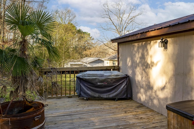 deck featuring a grill