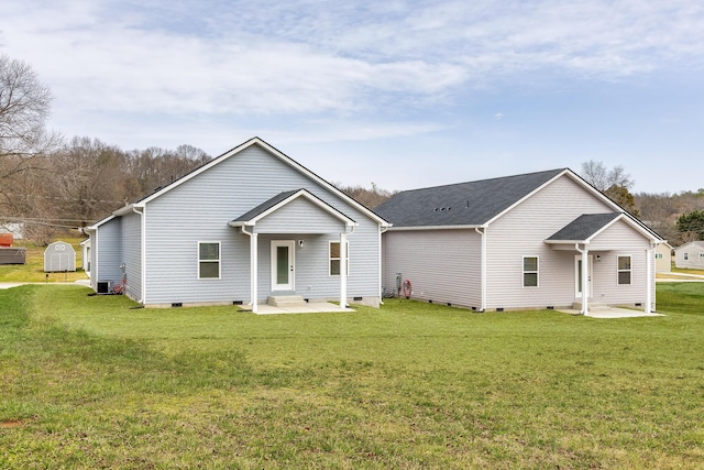 view of front facade with crawl space and a front lawn