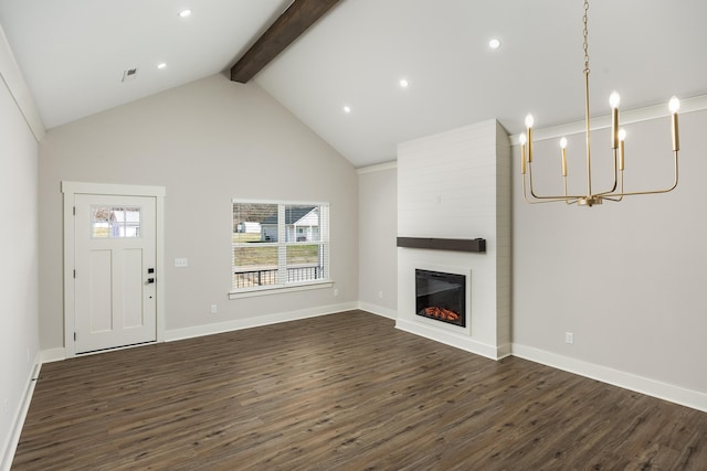 unfurnished living room featuring a large fireplace, baseboards, dark wood finished floors, and beam ceiling