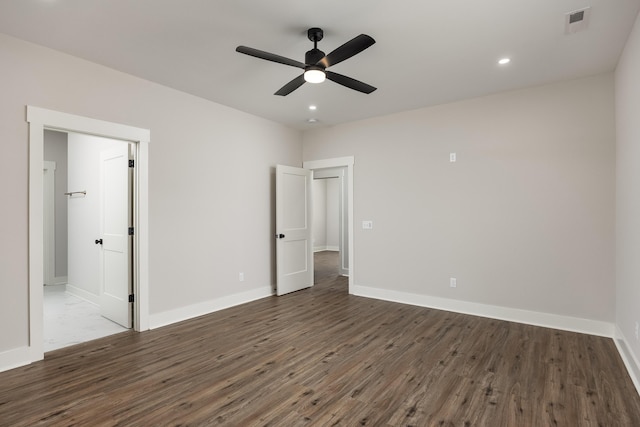 unfurnished bedroom featuring recessed lighting, wood finished floors, visible vents, and baseboards