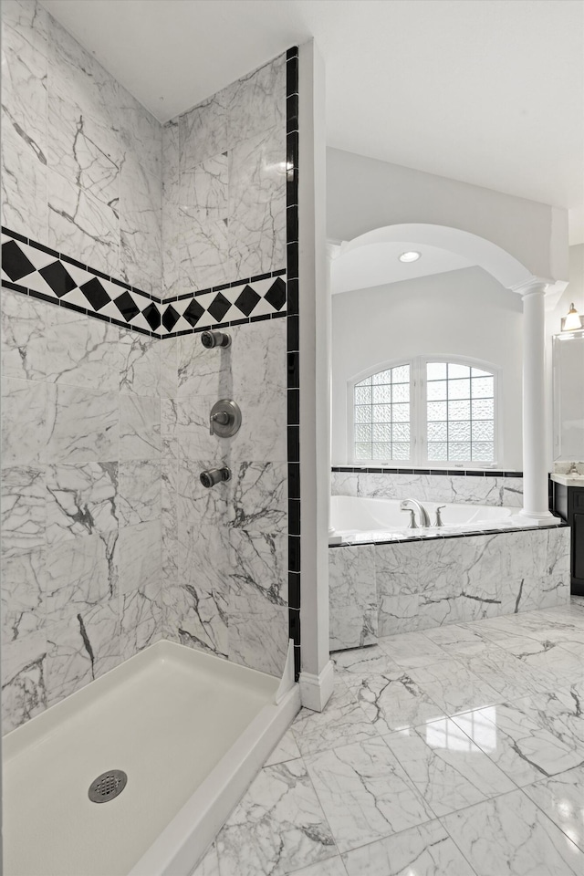 full bathroom with a marble finish shower, marble finish floor, ornate columns, and a bath