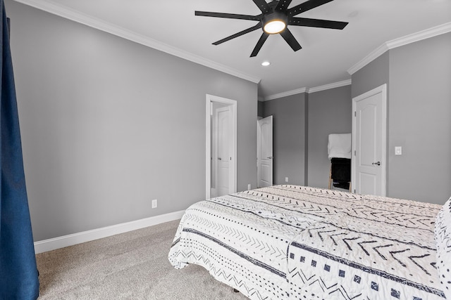 bedroom with a ceiling fan, baseboards, carpet, and crown molding