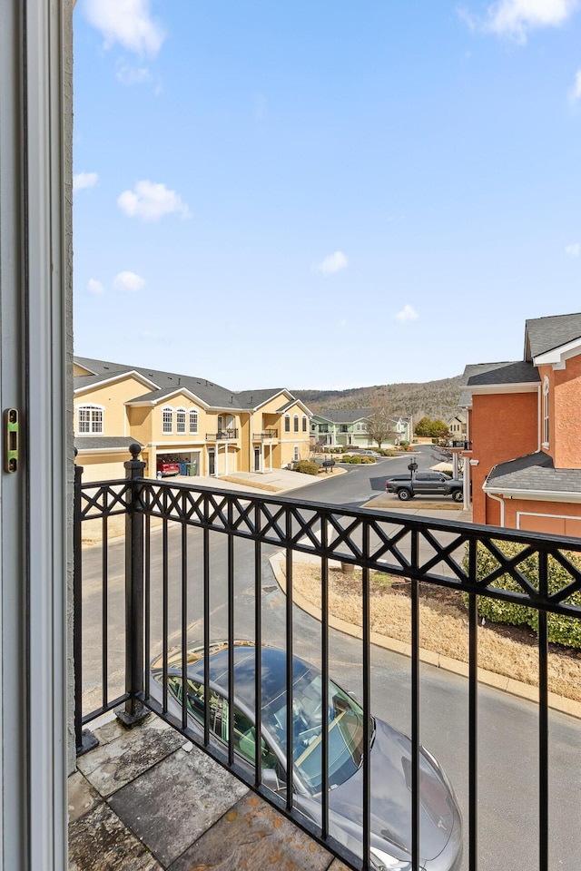 balcony featuring a residential view