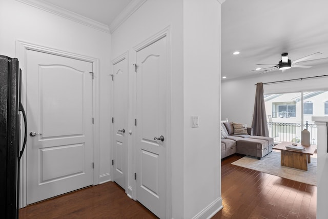 hall with recessed lighting, dark wood-style floors, and ornamental molding