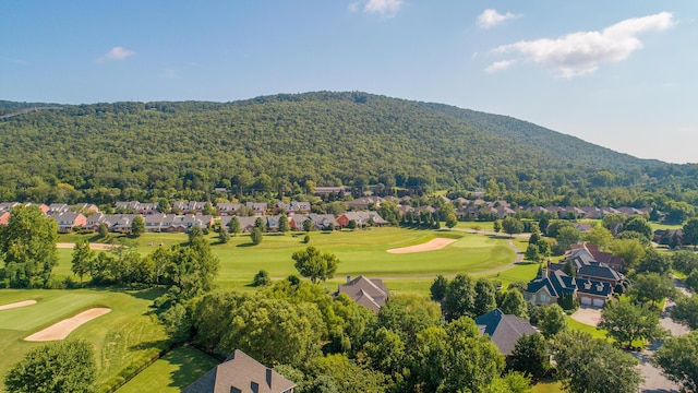 birds eye view of property with a residential view, a mountain view, and golf course view