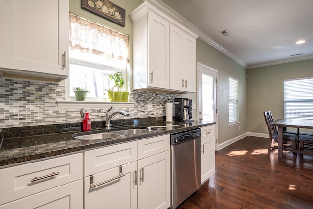 kitchen featuring dark wood-type flooring, ornamental molding, a sink, white cabinets, and dishwasher