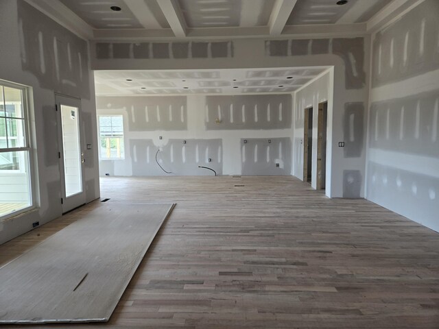 unfurnished living room featuring wood finished floors