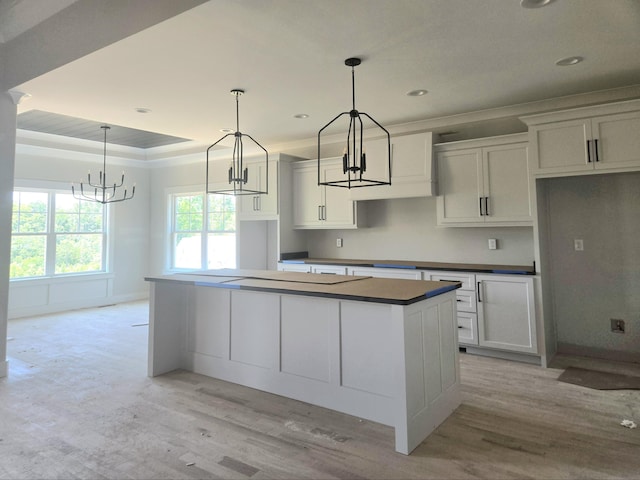 10634 Flicker Way Unit 119, Apison, TN 37302 - kitchen featuring a chandelier, light wood finished floors, a kitchen island, white cabinets, and recessed lighting