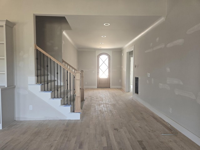 10634 Flicker Way Unit 119, Apison, TN 37302 - foyer featuring wood finished floors, stairs, and crown molding