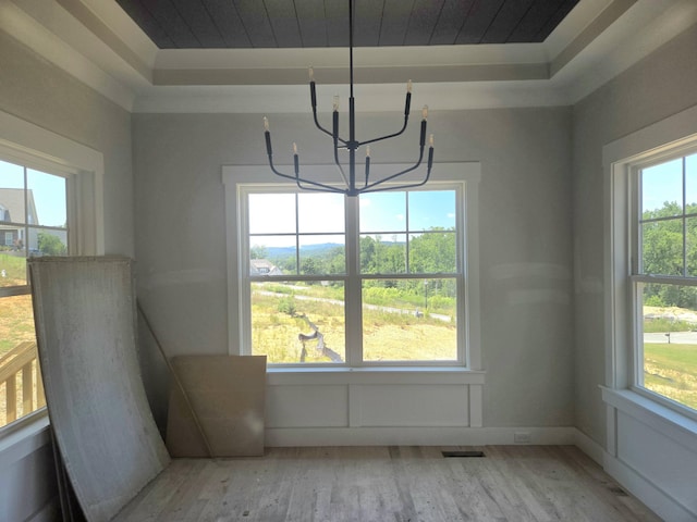 10634 Flicker Way Unit 119, Apison, TN 37302 - unfurnished dining area with light wood-style flooring, a chandelier, and wood ceiling