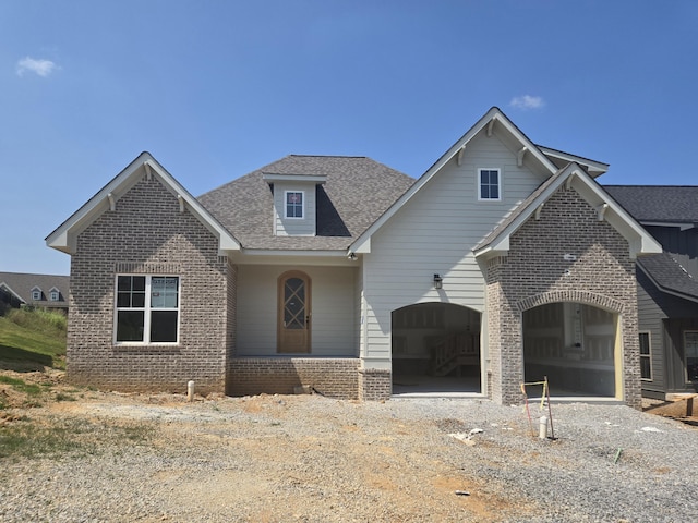 10634 Flicker Way Unit 119, Apison, TN 37302 - traditional-style home with brick siding, a garage, roof with shingles, and driveway