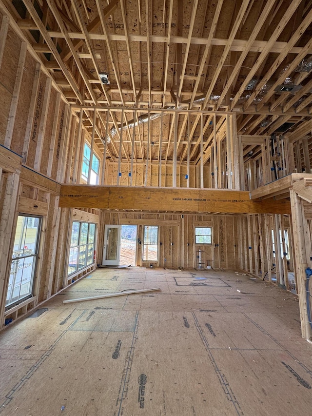 miscellaneous room featuring a high ceiling