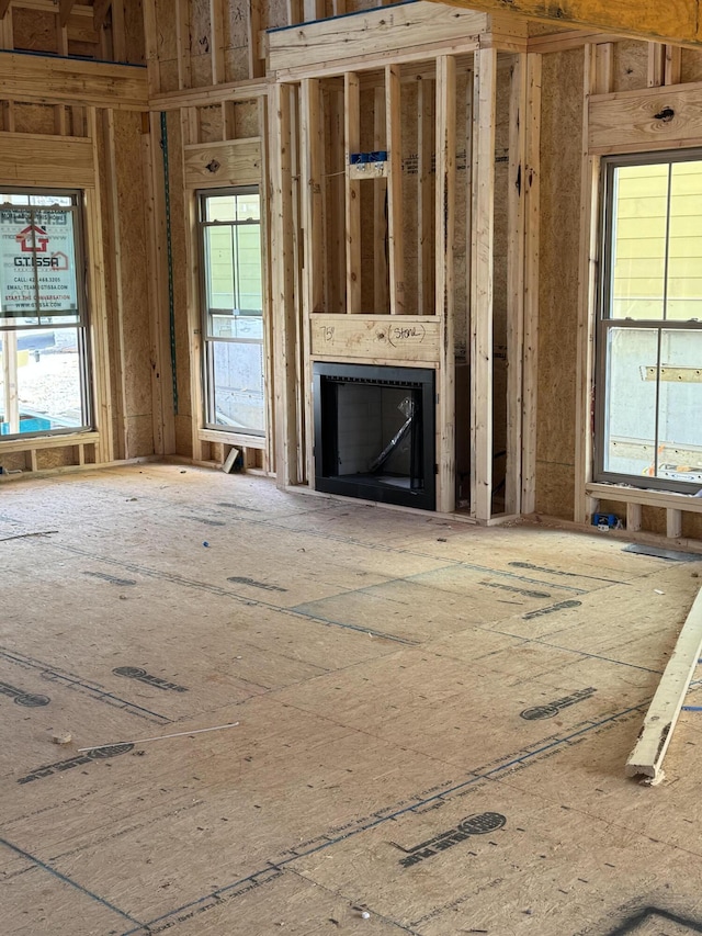 unfurnished living room with a wealth of natural light