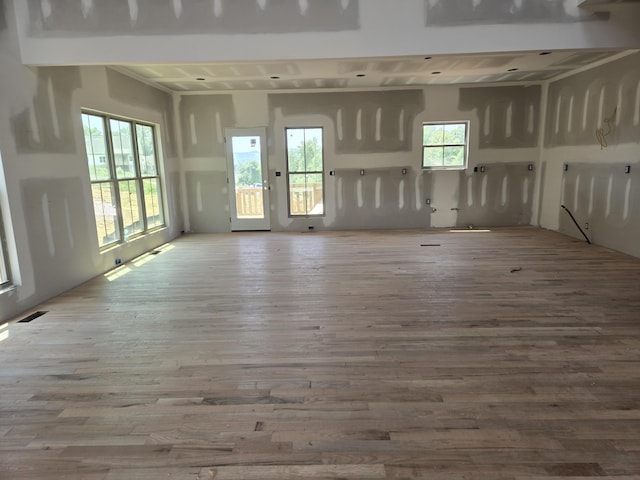 empty room with wood finished floors