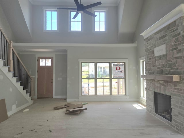 10630 Flicker Way Unit 120, Apison, TN 37302 - entrance foyer featuring a high ceiling, healthy amount of natural light, a stone fireplace, ceiling fan, and stairway