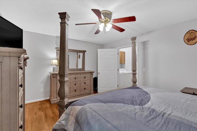 bedroom featuring ornate columns, light wood-style floors, a ceiling fan, a textured ceiling, and baseboards