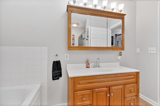 full bath with a shower, vanity, and a bathing tub