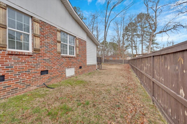 view of yard featuring a fenced backyard