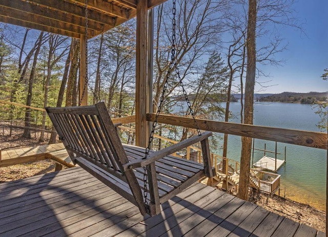 wooden terrace with a water view