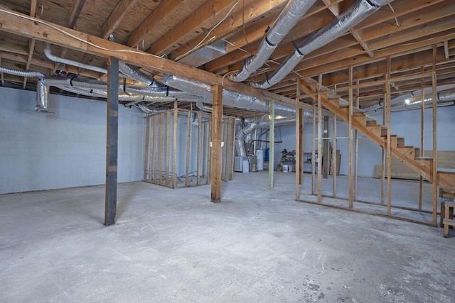 unfinished basement with stairway