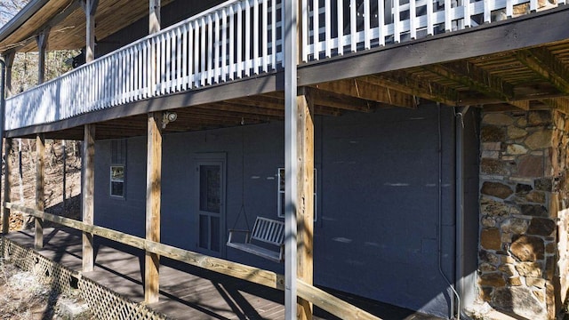 view of property exterior with stone siding