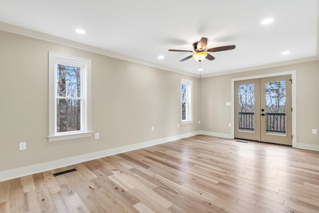 empty room featuring recessed lighting, baseboards, visible vents, and light wood finished floors