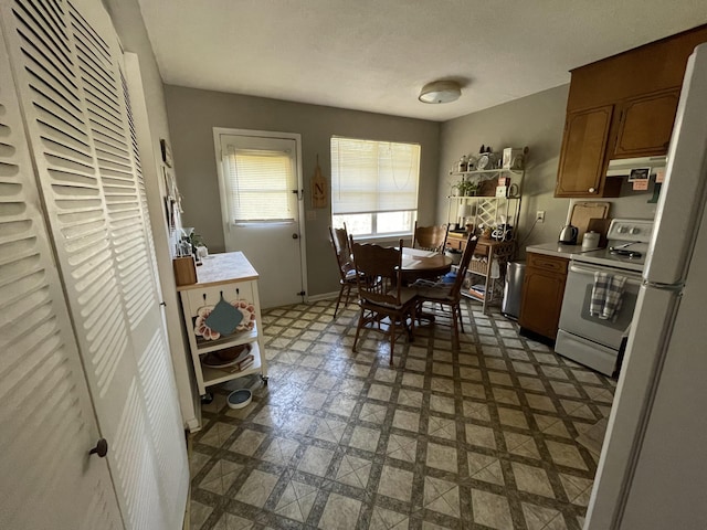 dining area featuring tile patterned floors