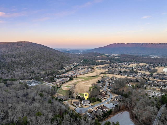 aerial view at dusk with a mountain view