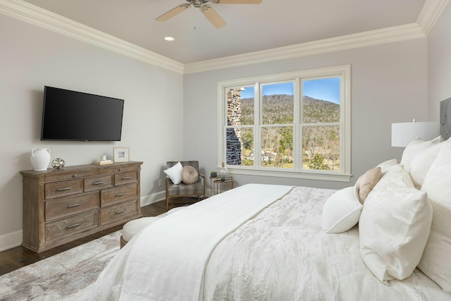 bedroom with baseboards, dark wood-style flooring, and ornamental molding