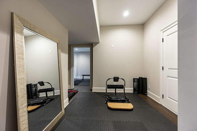 workout area with recessed lighting and baseboards