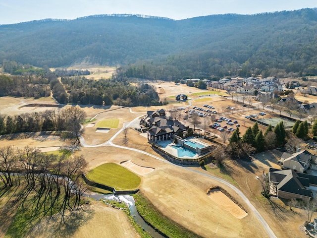 bird's eye view featuring a forest view