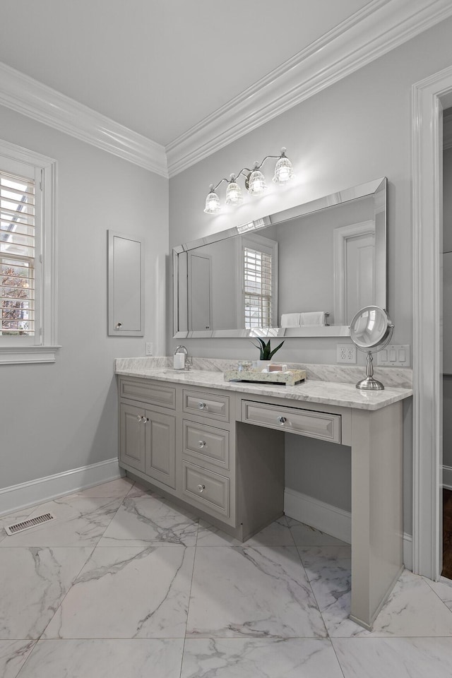 bathroom featuring visible vents, crown molding, baseboards, marble finish floor, and vanity