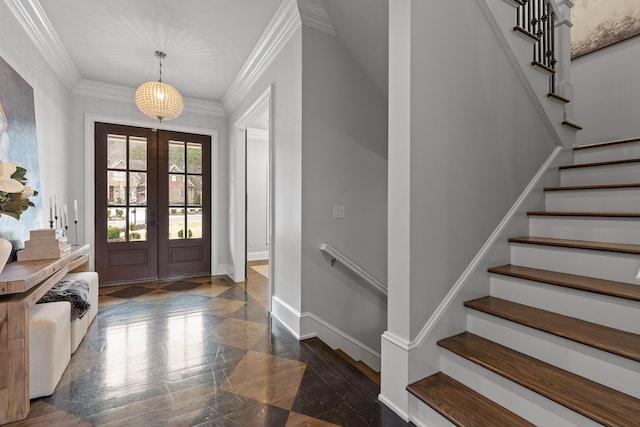 entryway featuring french doors, baseboards, ornamental molding, and stairs