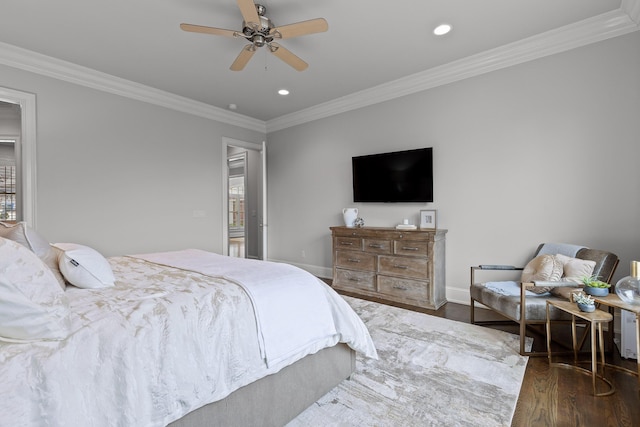 bedroom with recessed lighting, baseboards, dark wood finished floors, and crown molding