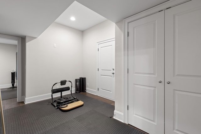 interior space featuring recessed lighting and baseboards