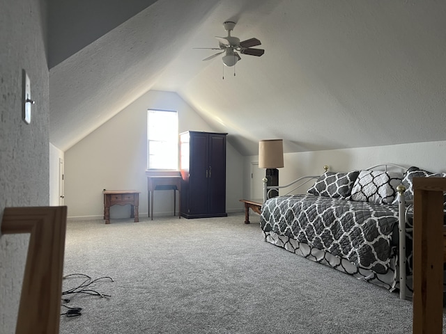 bedroom featuring lofted ceiling, a ceiling fan, light carpet, a textured ceiling, and baseboards