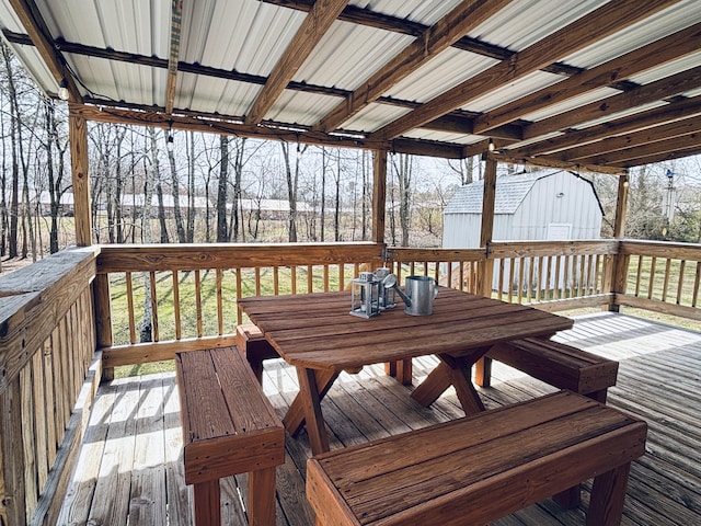 wooden deck with outdoor dining area